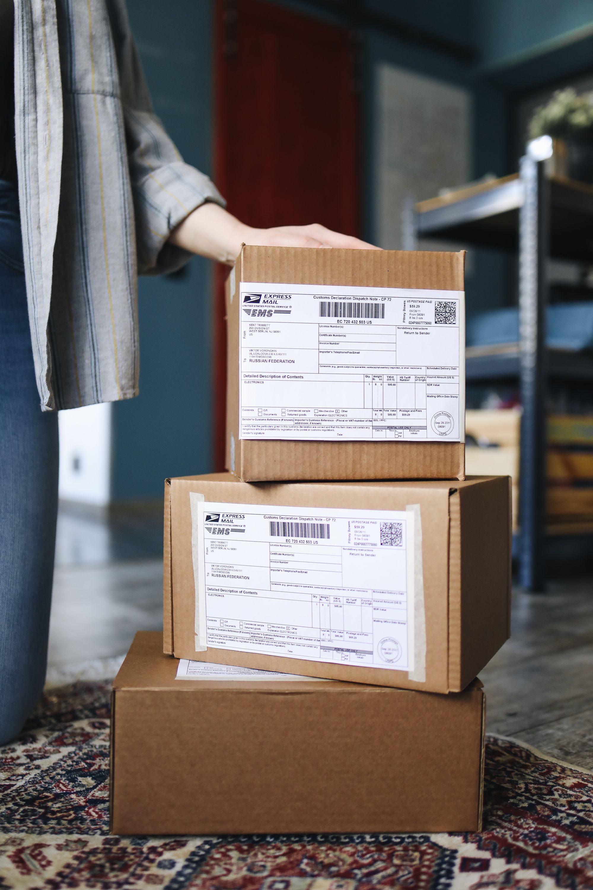 Woman happily unboxing her online shopping order
